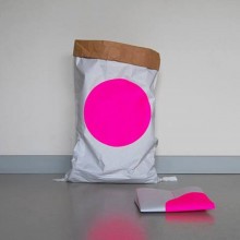 Paper bag made of recycled paper with pink dot